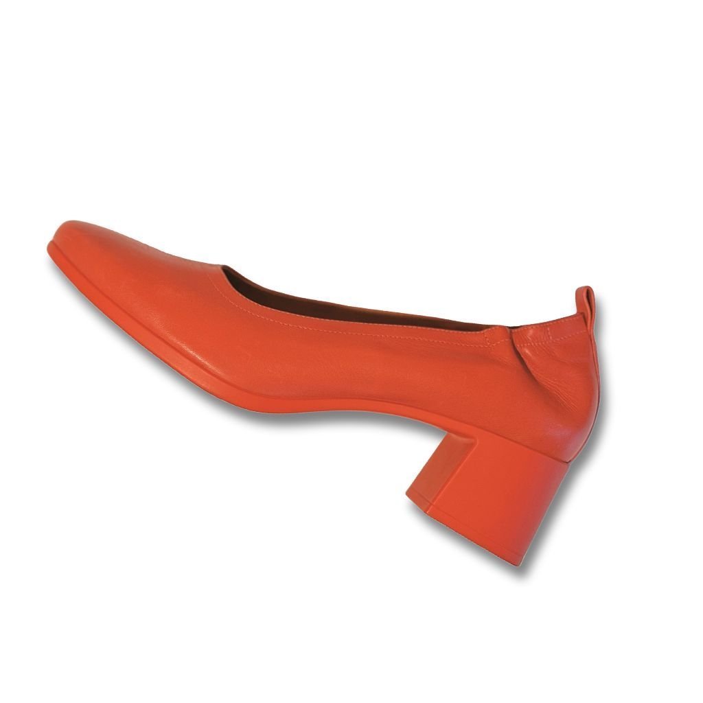 Side view of lava red PIAR Performance Heel highlighting shock-absorbing sole and block heel